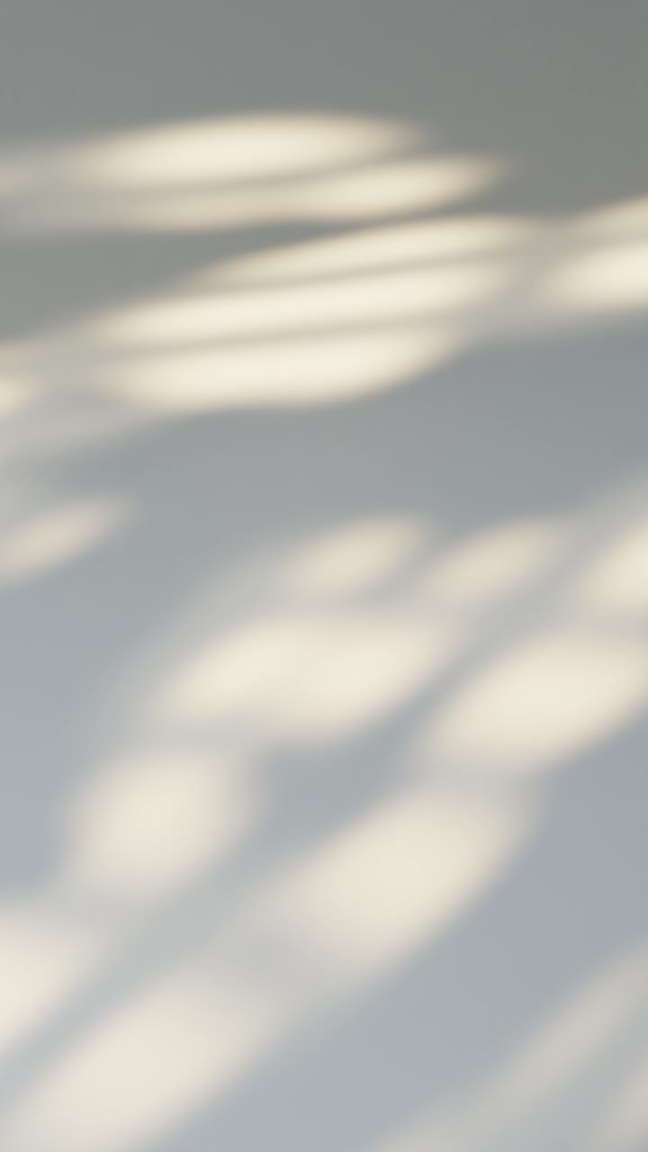 Organic Light and Shadow Patterns Moving on a Wall