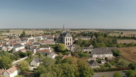 Aerial-drone-point-of-view-of-the-Abbaye-de-Fleury-in-the-Loire-Valley,-Saint-Benoit-sur-Loire,-France