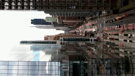 Downtown Manhattan, New York city skyline - ascending vertical establishing shot