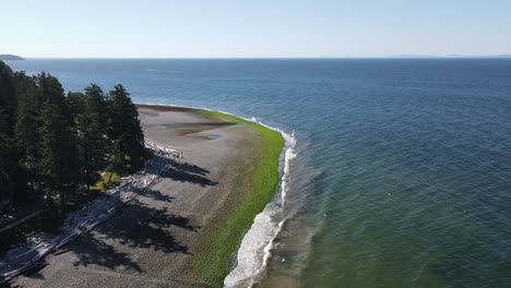 aerial view of an empty pebble beach at the sunshine coast in british columbia