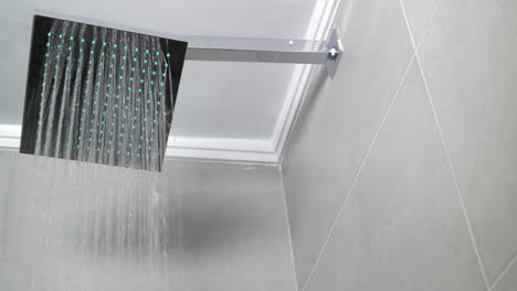 modern shower head in in shower cabin