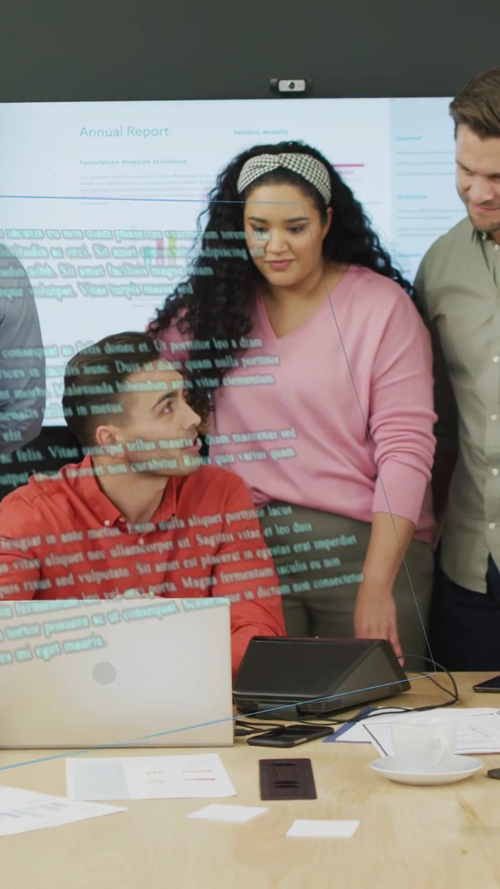 Vertical video: Analyst tapping laptop, team checking Annual Report slide, projection guiding plans