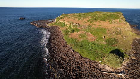 drone shot of cook island in nsw, australia