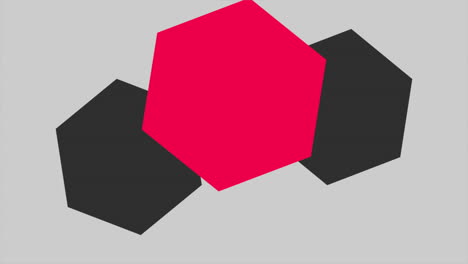 geometric red and black hexagons on grey gradient