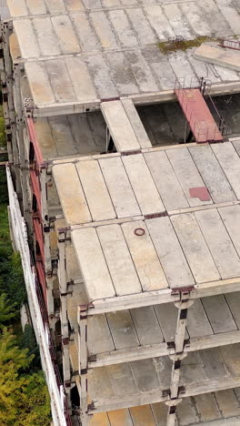 ruined broken city construction industry. old destroyed industrial building. vertical video
