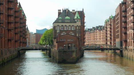 aug 2020, hamburg, germany: view of the river from the famous speicherstadt, a unesco world heritage site of the maritime history of the city