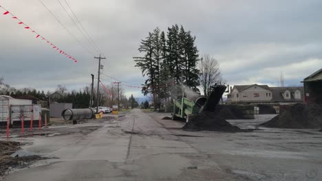 wood logging plant clears logs from flooding areas in popkum, bc