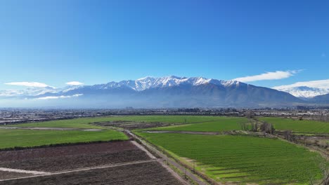 snowy andes mountain range after a day of rain, chile