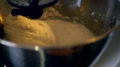 Mixing-the-gluten-free-dough-with-the-help-of-a-kitchen-assistent