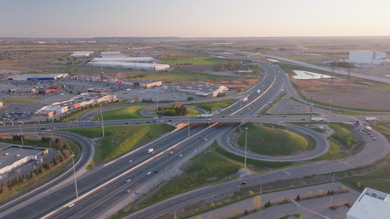 Mississauga highway 401, showcasing busy traffic and surrounding landscape, aerial view