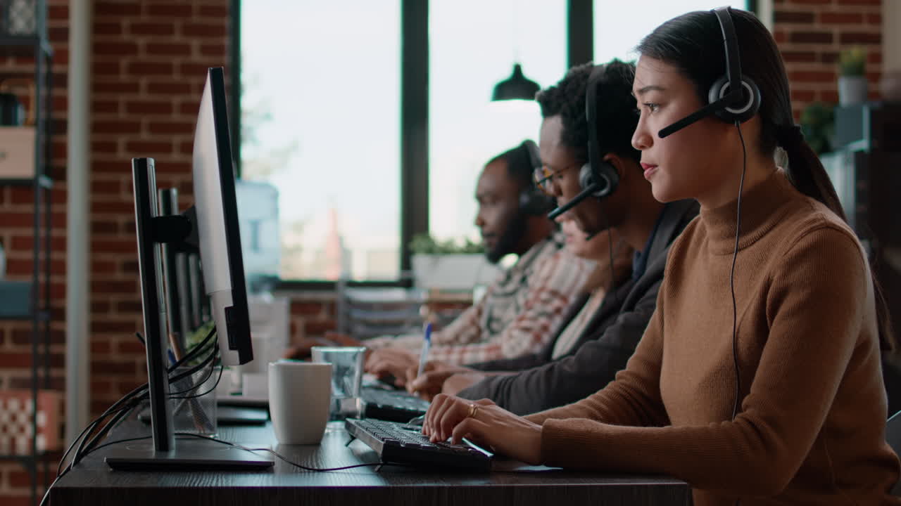 Office workers working at call center office to help people