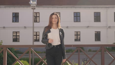 woman in leather jacket and jeans