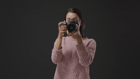 woman using camera