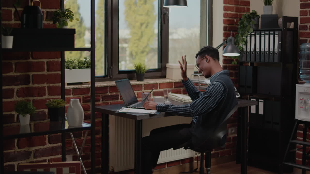 Business man using online video call to discuss leadership strategy