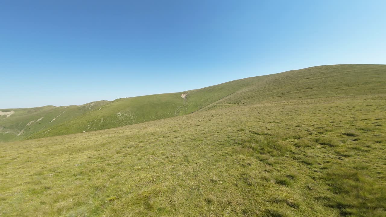 Grassy mountain slopes in the Fagaras Mountains, Romania