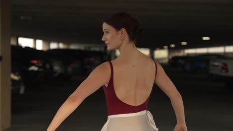 Elegant-girl-dancing-alone-in-a-parkade