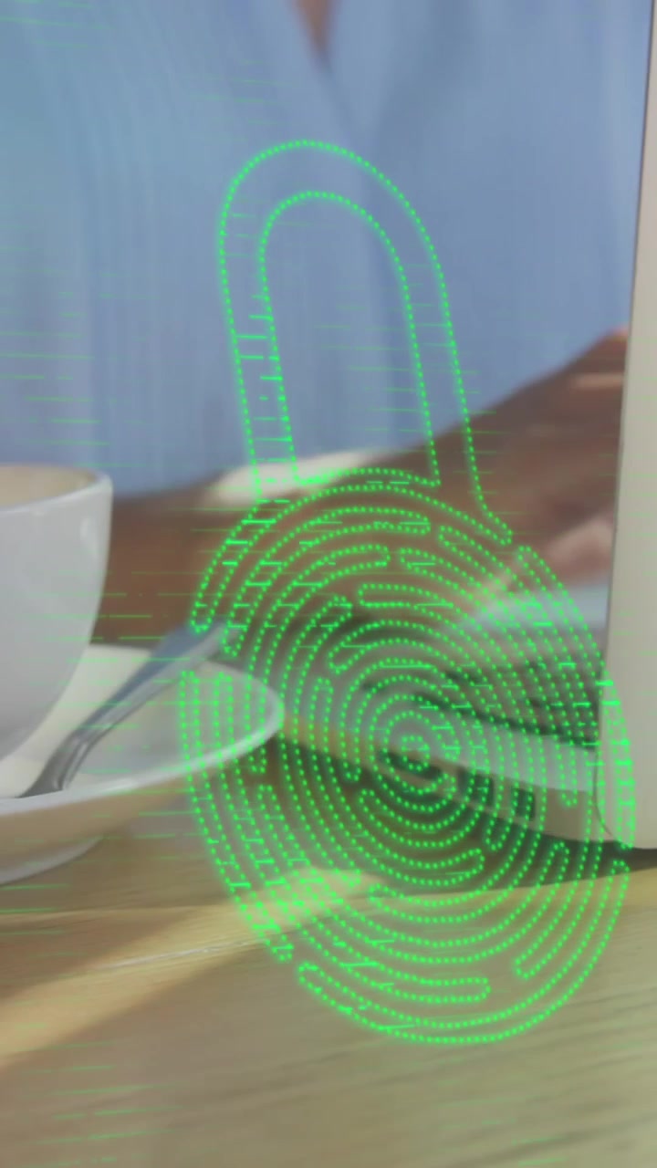 Animation of sunrays and fingerprinted padlock over midsection of caucasian woman using laptop