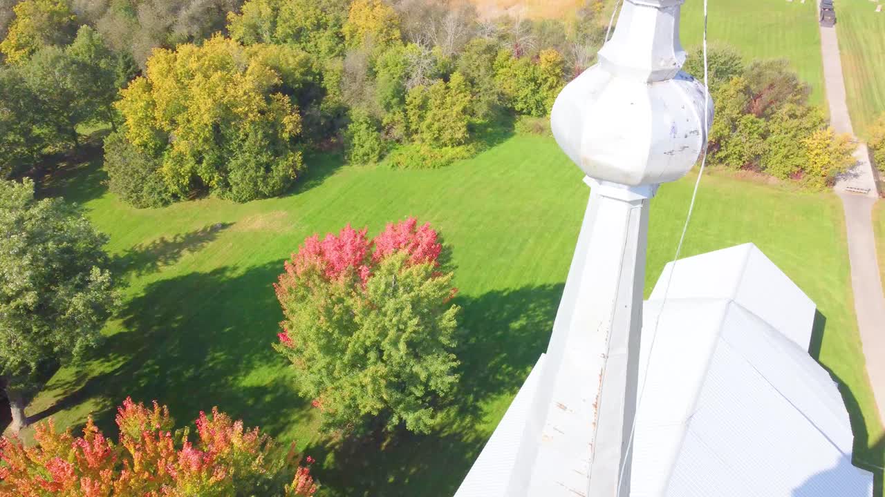 Drone descending and approaching the fields in an agricultural area located in Montr&eacute;al, Qu&eacute;bec, Canada