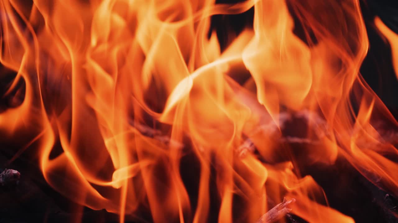 Burning fire. Bonfire. Closeup of flames burning on black background, slow motion