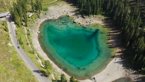 Total-view-of-Lago-di-Carezza,-taken-from-above-with-DJI-Mavic-2-Pro-with-the-Hasselbald-10-bit-camera