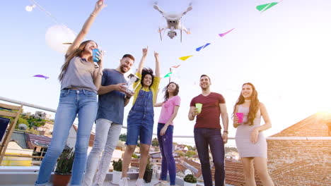 friends celebrating with drone party on