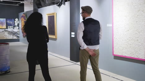 people visiting an art gallery