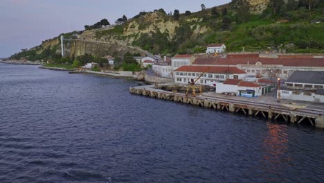 drone shot of the old warehouses in almada