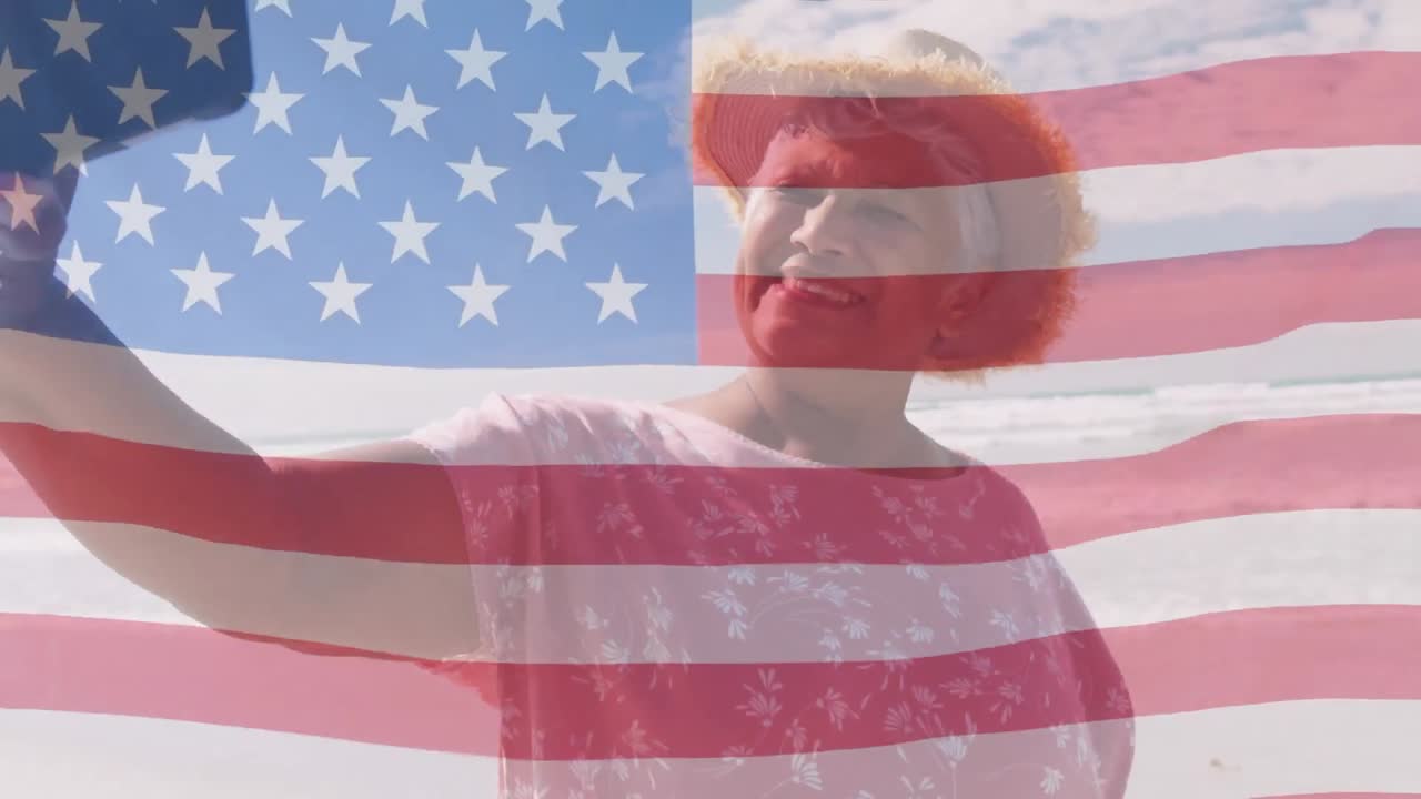 해변에 있는 노인 아프리카계 미국인 여성 위에 있는 미국 국기의 애니메이션