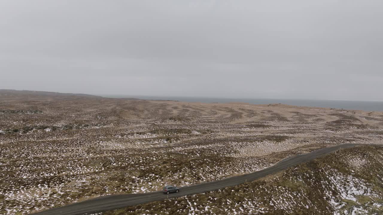 following a car to the Djúpalónssandur beach, Orbiting around, Iceland