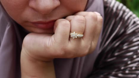 close up of women hand with wedding ring