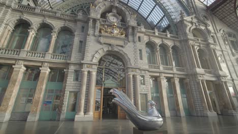 antwerp central station interior with sculpture
