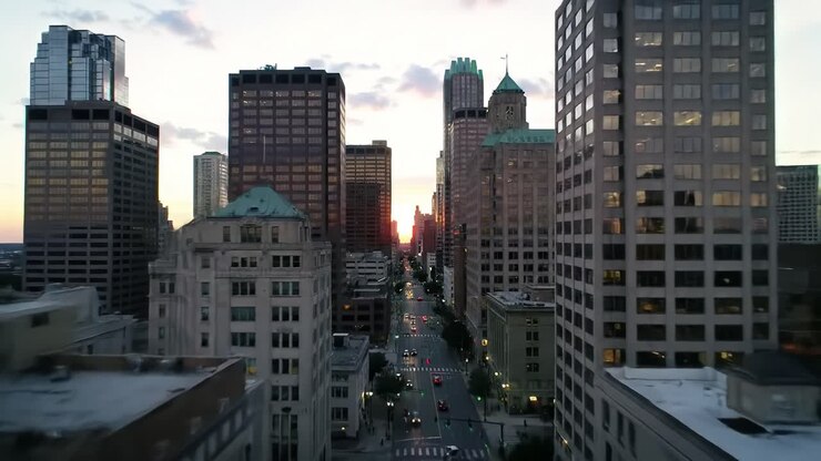 Cityscape at Dusk: A Stunning View of Urban Architecture as Sunset Casts a Golden Glow Over Skyscrapers and Streets