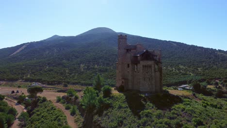 amazing aerial shots of the castillo de mota in andalucia in the middle of the mountains and nature