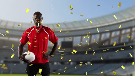 professional rugby player standing in front of a stadium with confetti falling