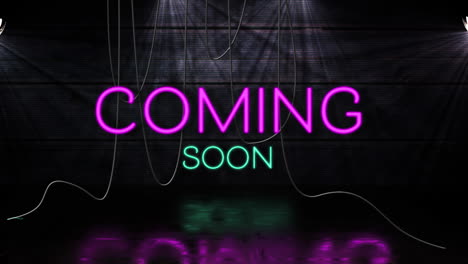 animation of coming soon text in pink and blue neon letters on black background