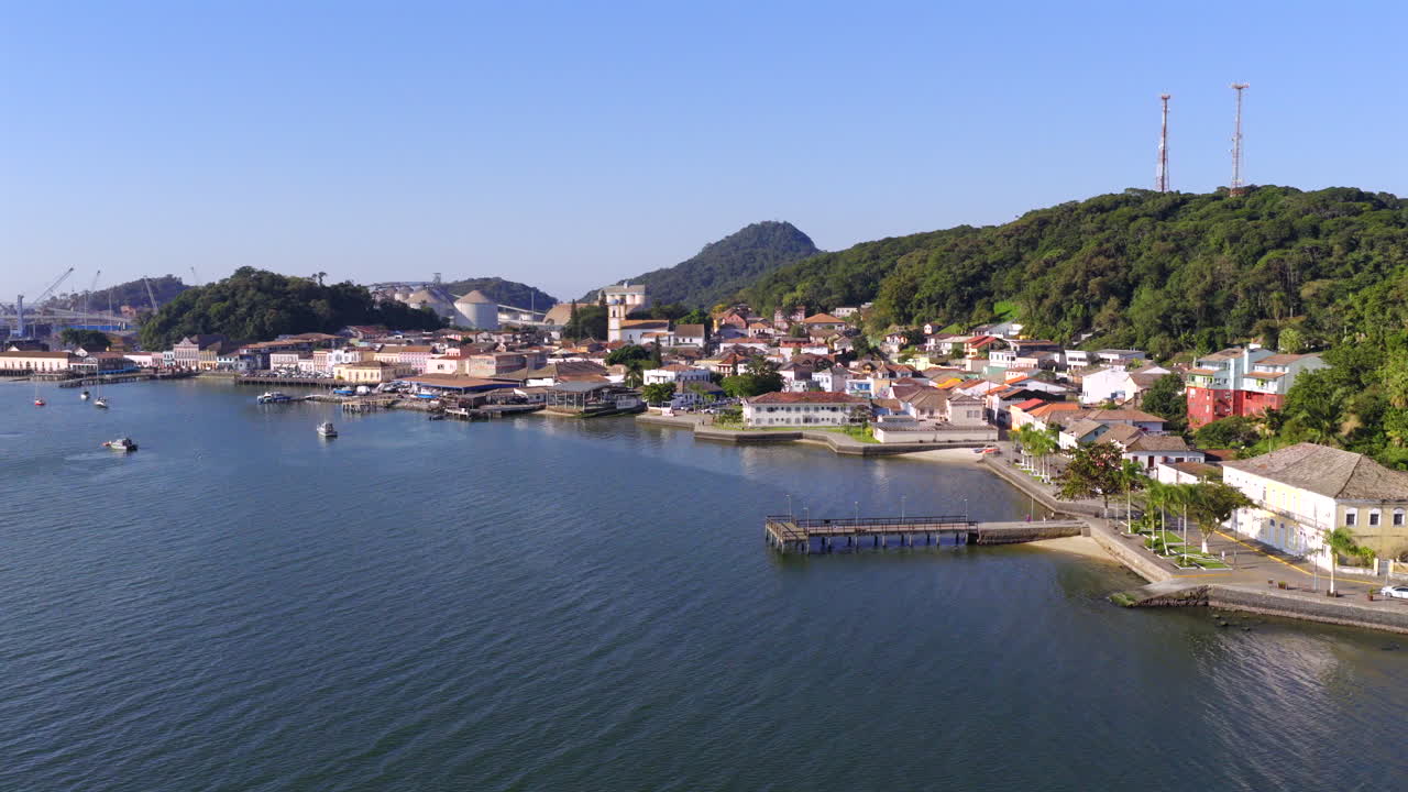 Aerial view of a coastal Sao Francisco do Sul municipality with hills and waterfront buildings by Baia da Babitonga bay, Santa Catarina, Brazil