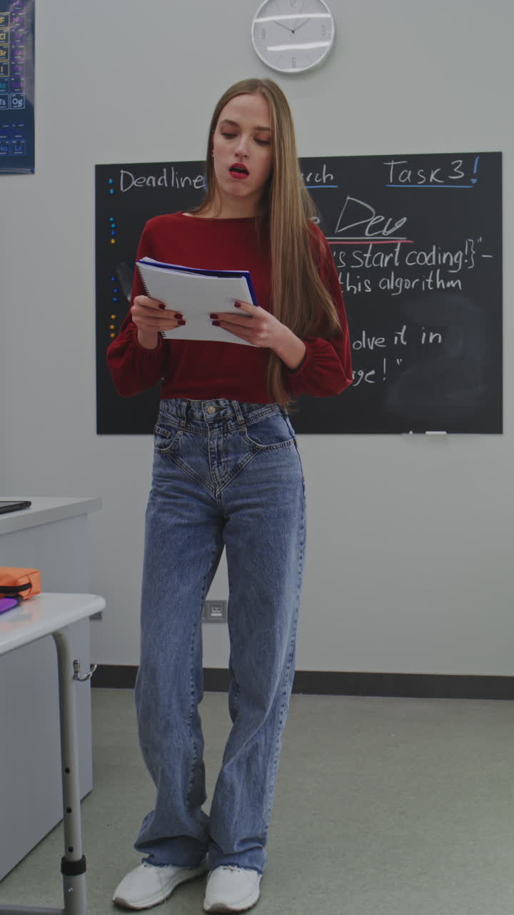 Teacher explaining task to students in classroom