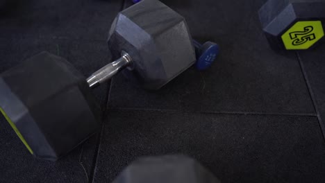 view of dumbbells in a gym, high angle shot