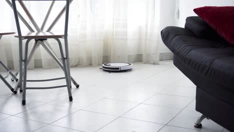 robot vacuum cleaner working at the living room