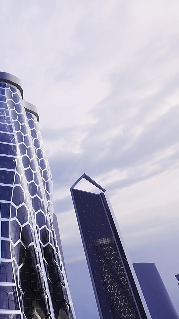 Edifici moderni si ergono contro il cielo nuvoloso in una vista dello skyline cittadino.