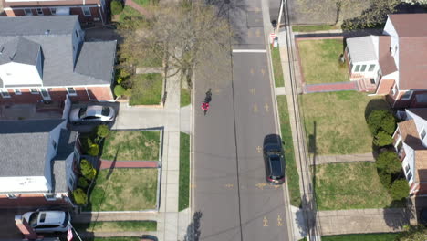 An-aerial-shot-over-a-suburban-neighborhood-on-a-sunny-day