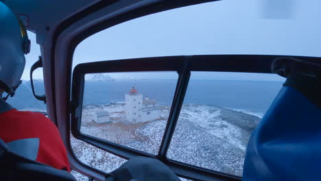 landing on an island next to a lighthouse on a remote island outside on the norwegian sea, lofoten norway, handheld