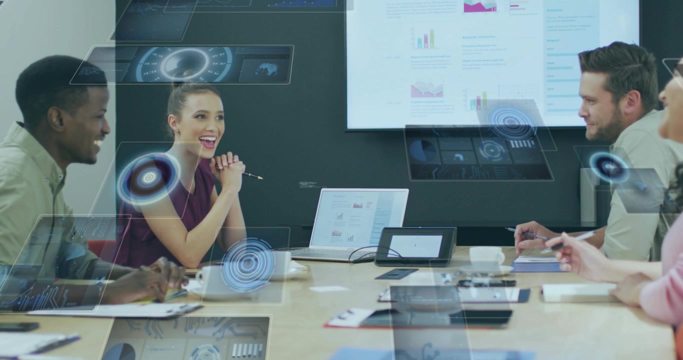 Woman leading business meeting gesturing and sharing charts for insights while colleagues listening