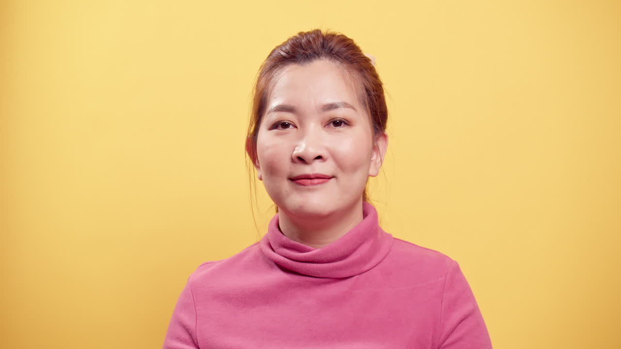 Asian woman very glad, she screaming loud