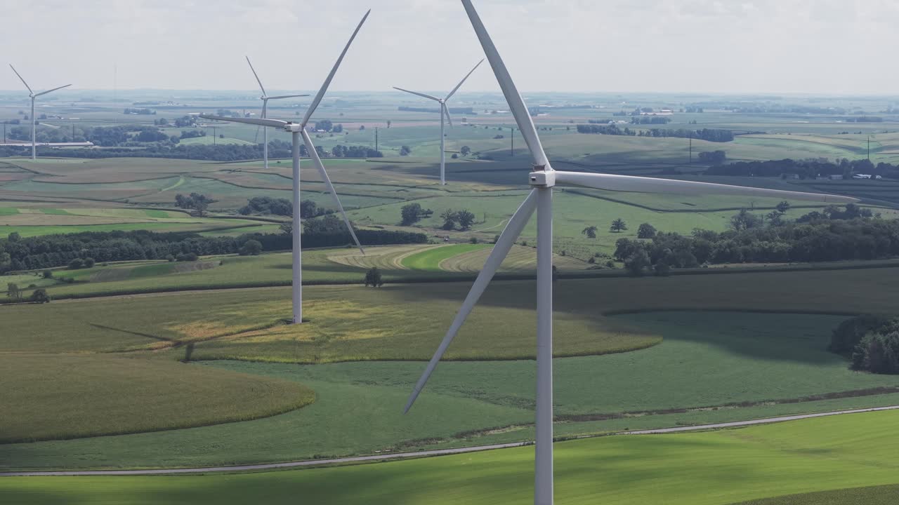 Wind turbines spin in southwest Wisconsin's Driftless area. A wind turbine is a device that converts the kinetic energy of wind into electrical energy