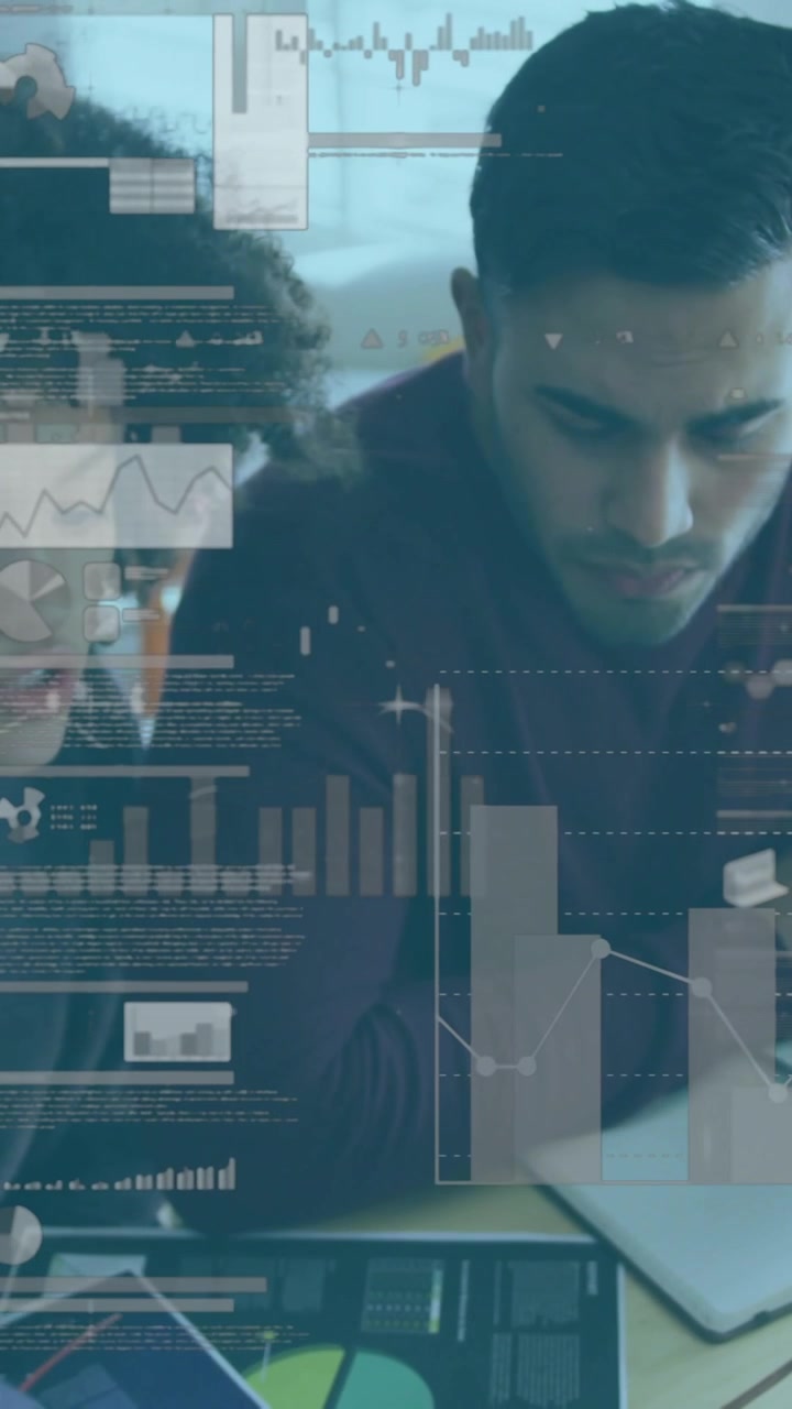 Diverse colleagues analyzing financial graphs and charts over digital data animation