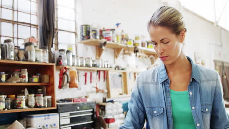 portrait of attractive female  carpenter working