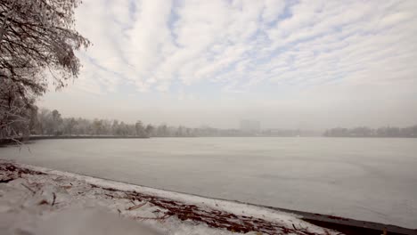 winter timelapse a frozen lake and fast moving clouds