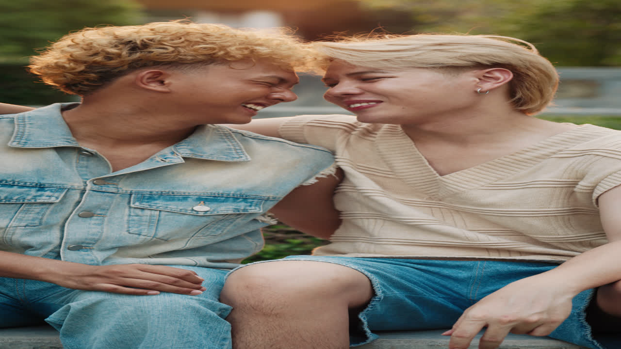 Two young men in love sharing a happy moment together