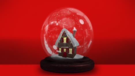 Animation-of-house-in-snow-globe-over-red-background
